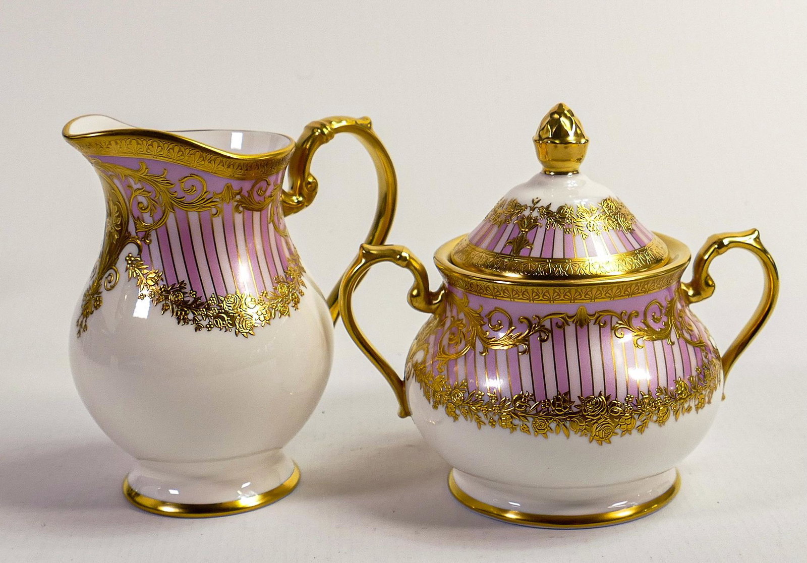 De Lamerie Fine Bone China blush pink Carnival patterned milk jug & sugar bowl, specially made high: De Lamerie Fine Bone China blush pink Carnival patterned milk jug & sugar bowl, specially made high end quality items. (2)
