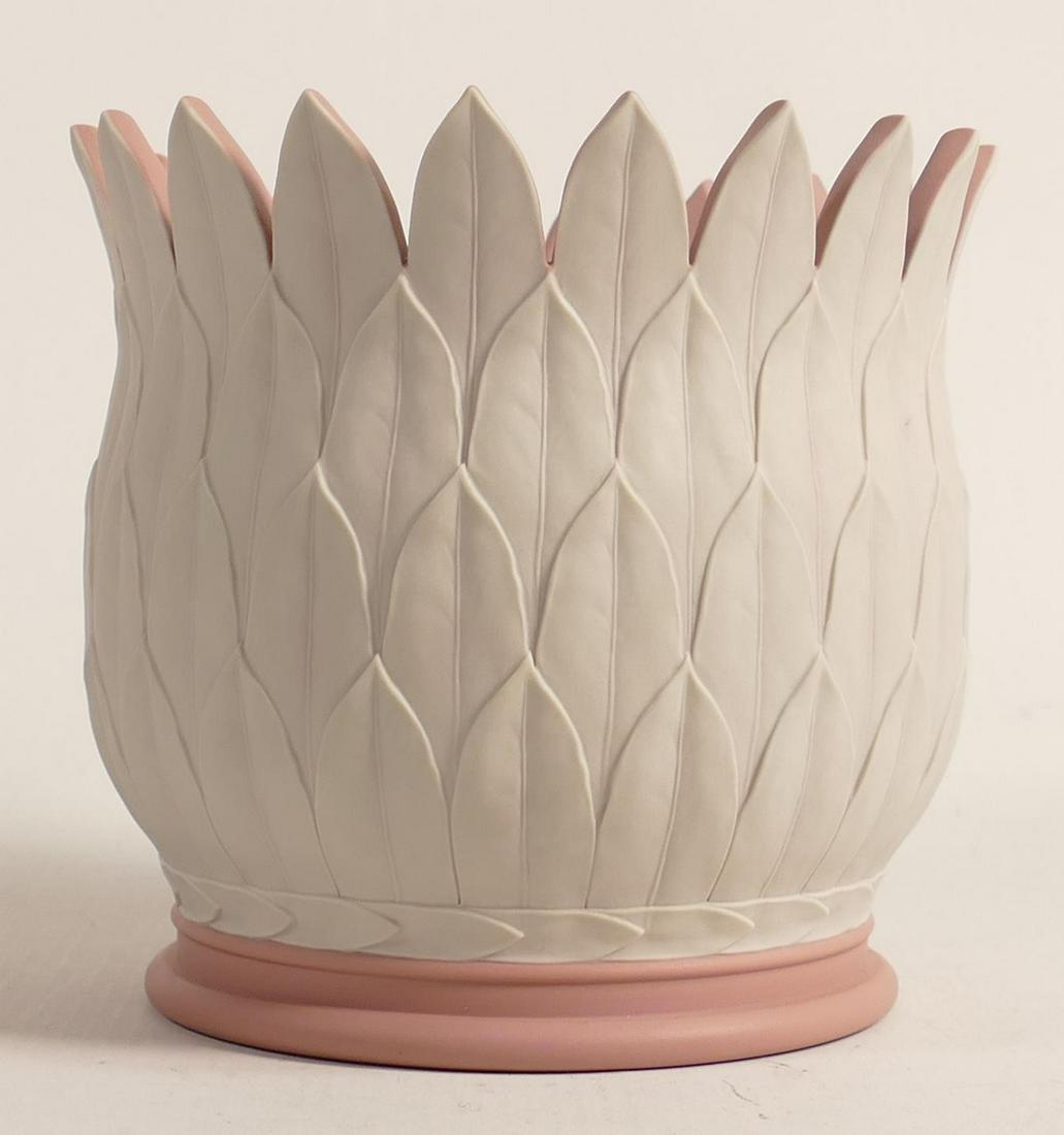 A Wedgwood unique studio vase by Paul Harper. In white (overlay) on pink Jasperware, leaf tips (1 of 3)