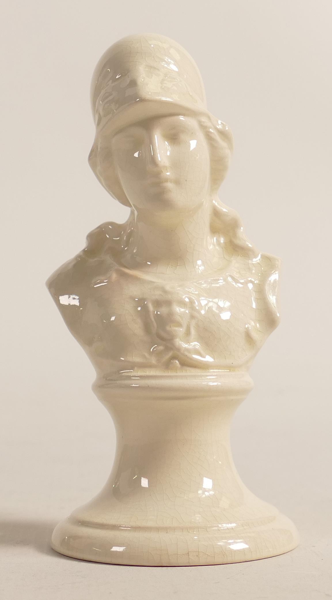 A c1934 Wedgwood Etruria creamware neoclassical diminutive bust of Minerva. Measures 13cm in height, (1 of 3)