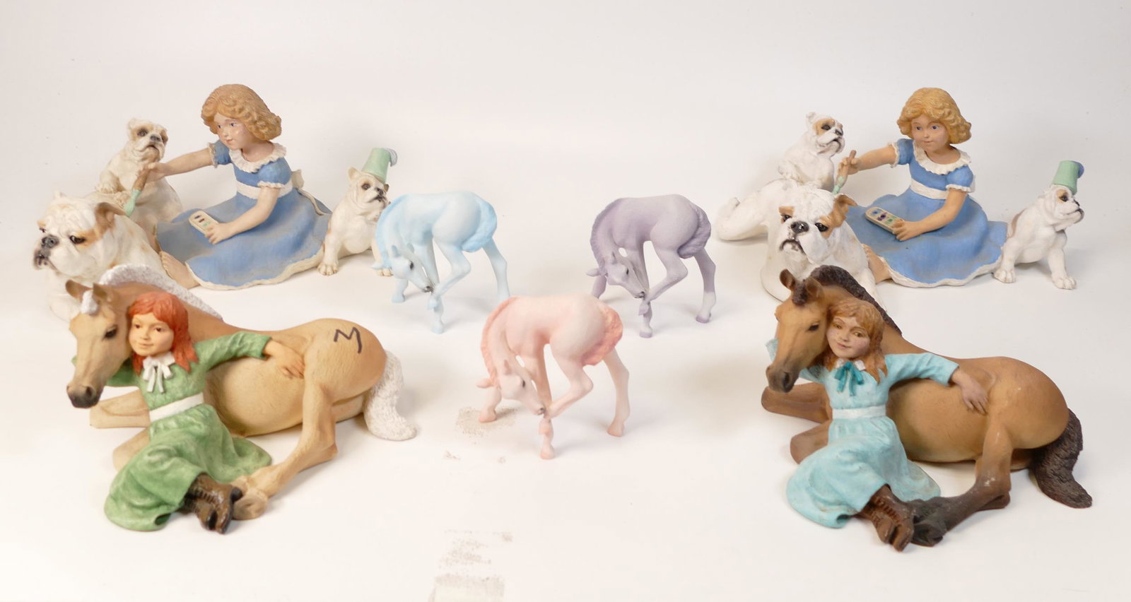 A collection of Wade Ceramic Northlight Figure of Horses , Dogs & Children. These were removed from: A collection of Wade Ceramic Northlight Figure of Horses , Dogs & Children. These were removed from the archives of the Wade factory and are possible prototypes or colour samples (10)