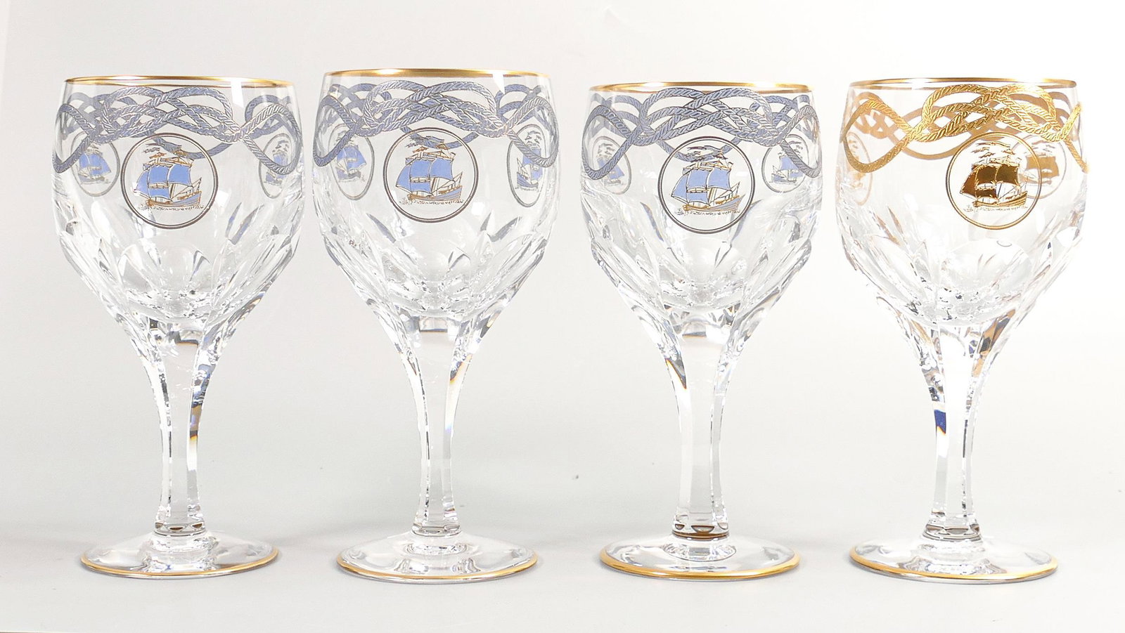 De Lamerie Fine Bone China Rope & Tassel Patterned Wine Glasses ( one glass with Captains Gold: De Lamerie Fine Bone China Rope & Tassel Patterned Wine Glasses ( one glass with Captains Gold Finish) , specially made high end quality item, Made in England, height of tallest 17cm(4)