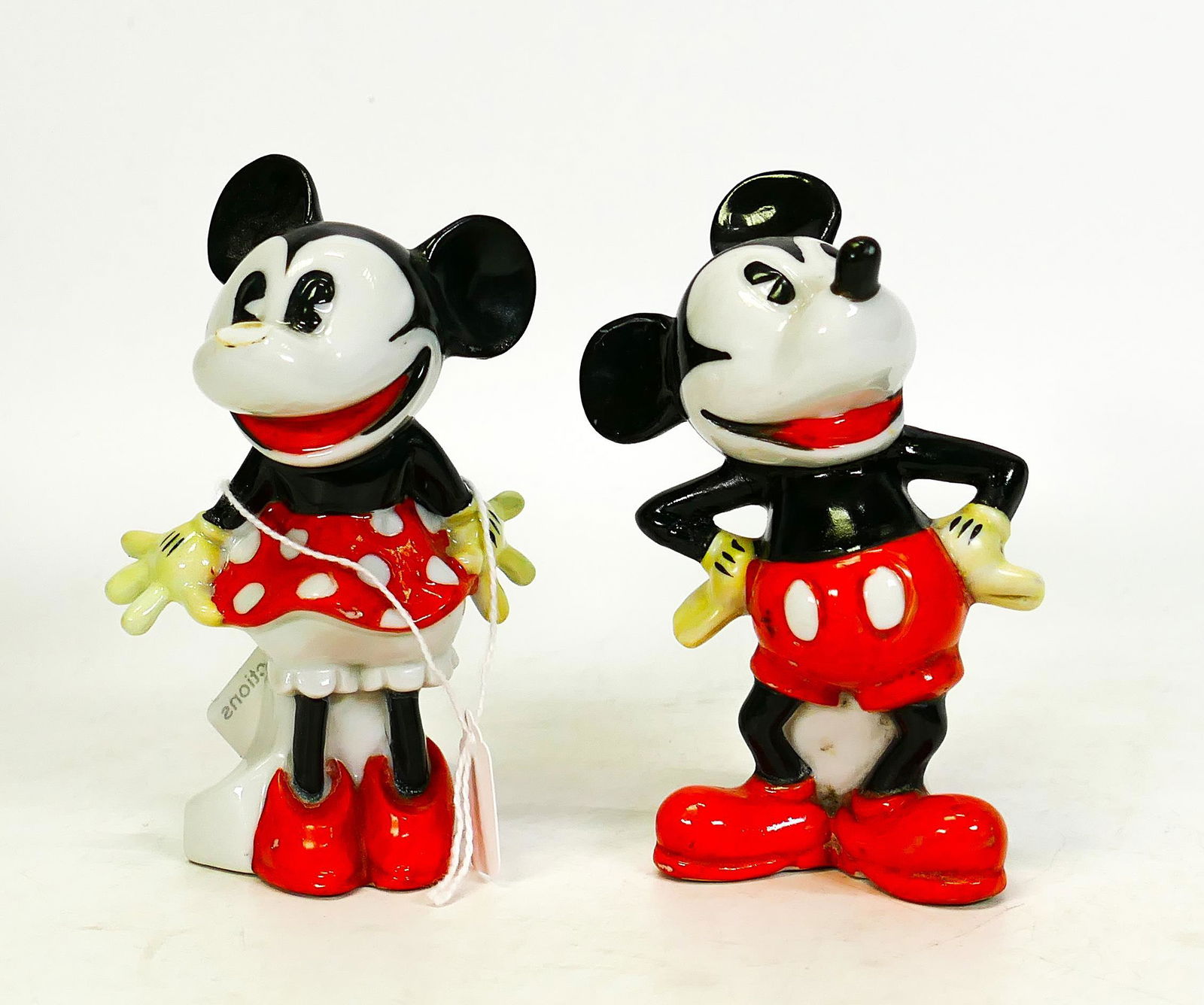 Genuine Walt Disney copyright ceramic Minnie (a/f) & Mickey Mouse toothbrush holders, each stamped (1 of 1)