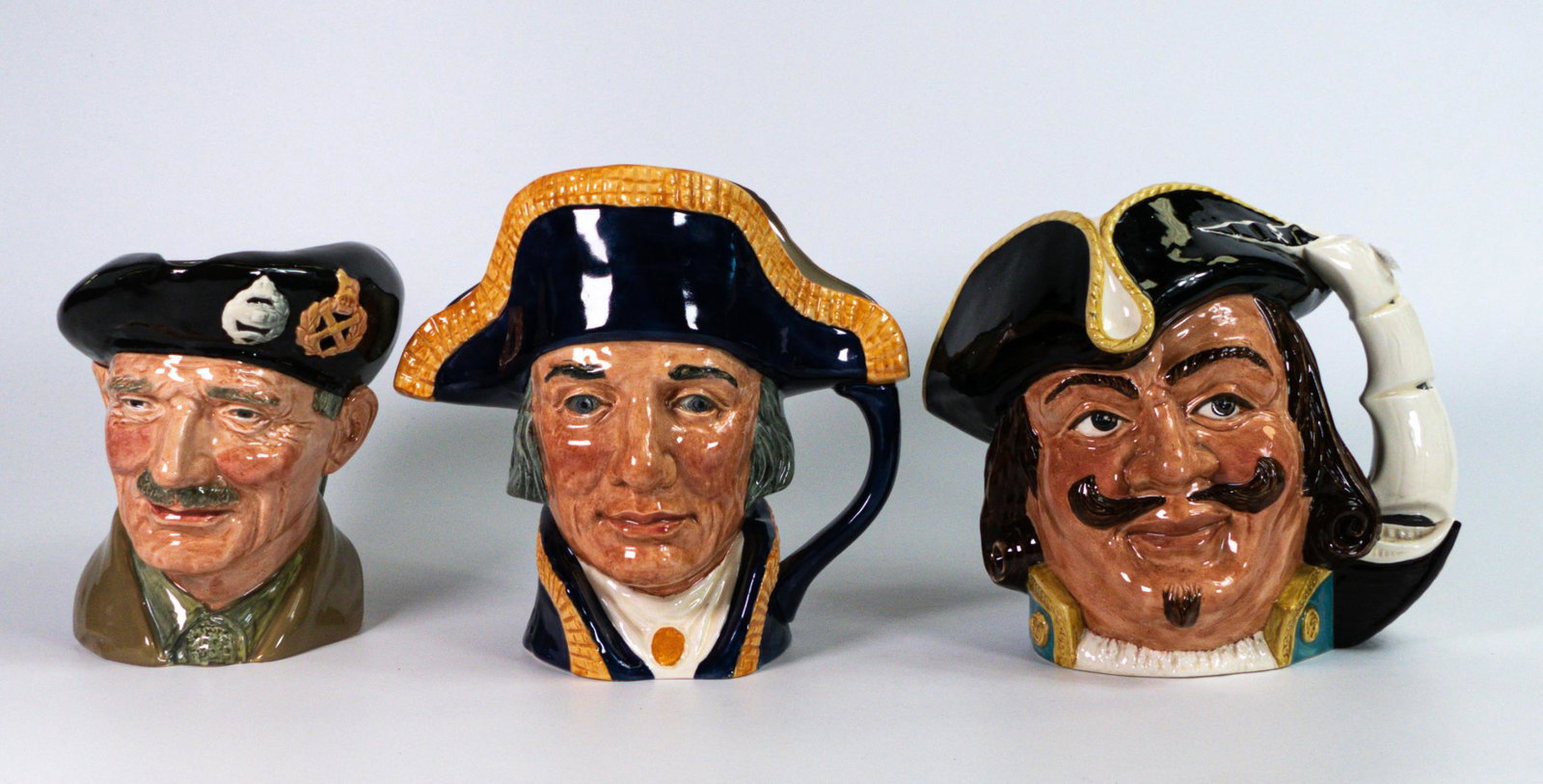Royal Doulton large character jugs to include Monty, lord Nelson D6336 and Capt Henry Morgan D6467: Royal Doulton large character jugs to include Monty, lord Nelson D6336 and Capt Henry Morgan D6467 (3)