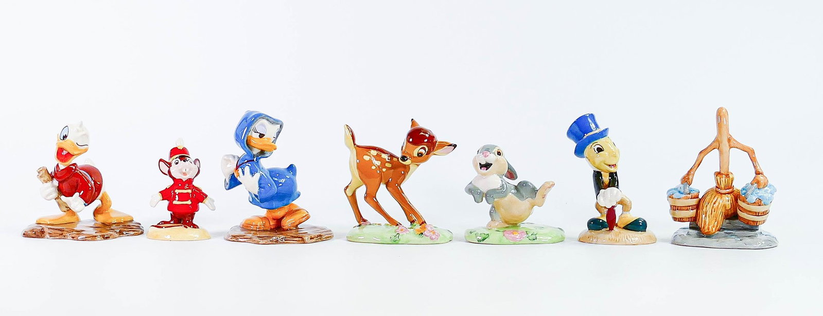 Seven Royal Doulton Disney Showcase limited edition collection figures comprising of Noah's Helper,: Seven Royal Doulton Disney Showcase limited edition collection figures comprising ofNoah's Helper, Heart on a String, Thumper, Buckets of Mischief, Timothy Mouse, Bambi and Jiminy Cricket, boxed and c