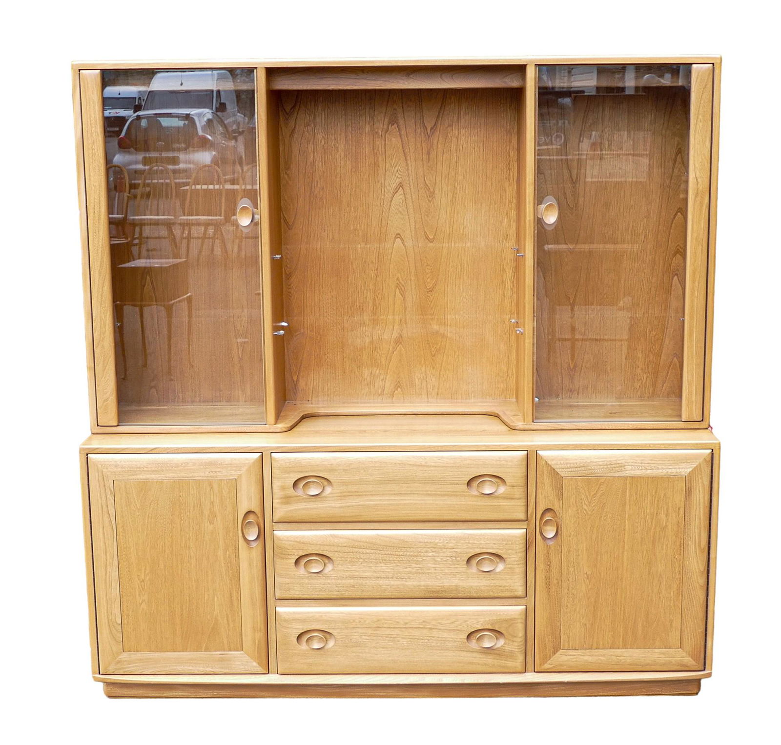 Late 20th century light coloured Ercol Windsor sideboard 2073 with display top 2161 & lighting,: Late 20th century light coloured Ercol Windsor sideboard 2073 with display top 2161 & lighting, length 156cm, depth 43.5cm & height 160cm