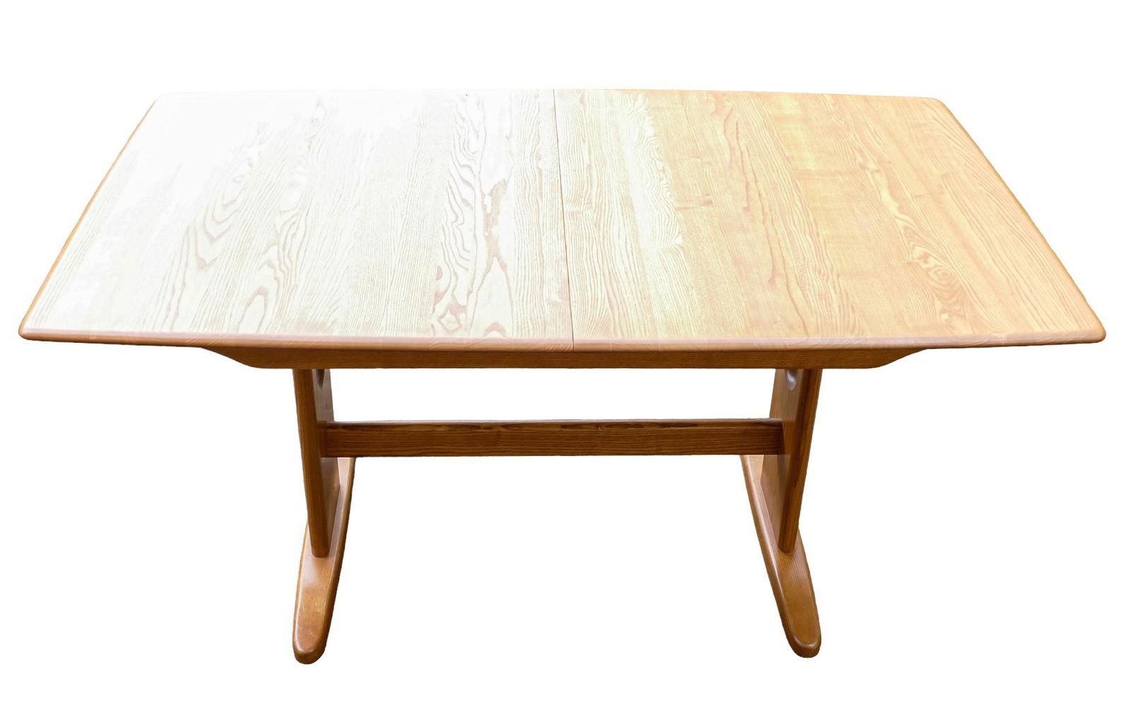 Late 20th century Light coloured Ercol Windsor medium dining table (extendable) 1193 plus specially: Late 20th century Light coloured Ercol Windsor medium dining table (extendable) 1193 plus specially made table protector matts (1 for normal table size & 1 for extended size) closed size length 152cm,