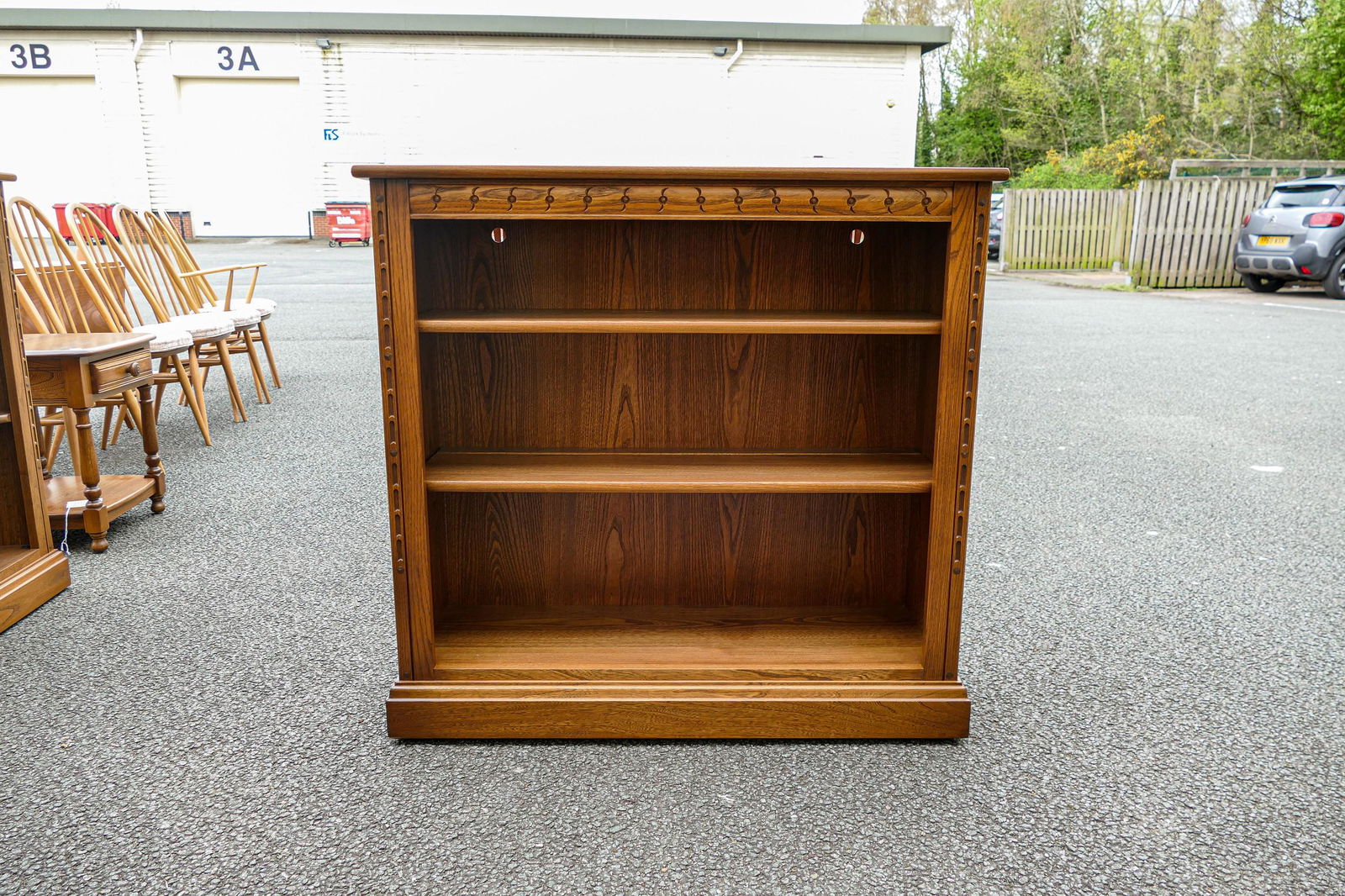 Late 20th century Ercol two shelf bookcase, length 96cm, depth 33.5cm & height 91.5cm: Late 20th century Ercol two shelf bookcase, length 96cm, depth 33.5cm & height 91.5cm