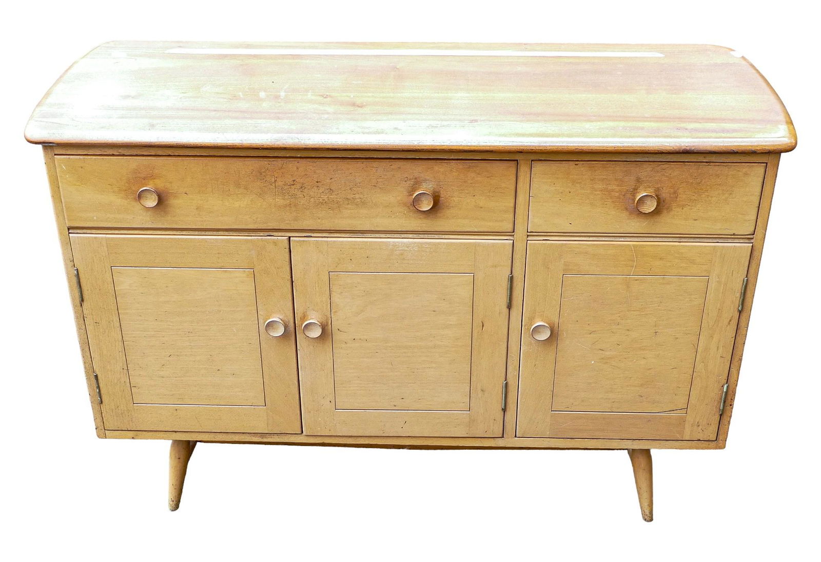 Late 20th century light coloured Ercol three door three drawer sideboard, length 120cm, depth 46cm &: Late 20th century light coloured Ercol three door three drawer sideboard, length 120cm, depth 46cm & height 82cm