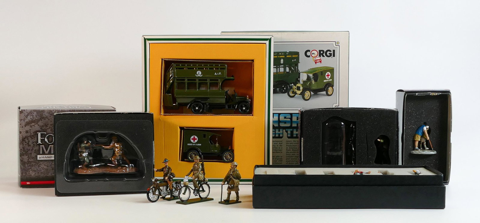 A collection of Corgi British toy soldier company & Rank & File branded metal toy soldiers &: A collection of Corgi British toy soldier company & Rank & File branded metal toy soldiers & vehicles including set 67 WWII Mule & Handler, WWI Highland Officer, US Motorcyclist Standing Set 108 WWI S