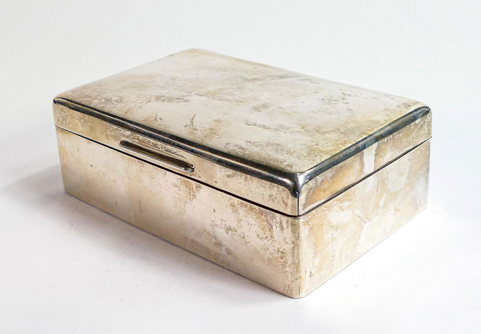 Silver cigarette box, hallmarked London 1944, gross weight with loading 336.6g.  No engraved names (1 of 4)