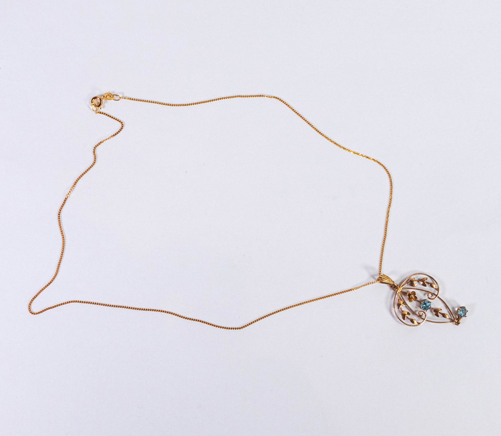 9ct gold and aquamarine pendant (not hallmarked but tested as 9ct) & 9ct gold chain, 45cm long. (1 of 2)