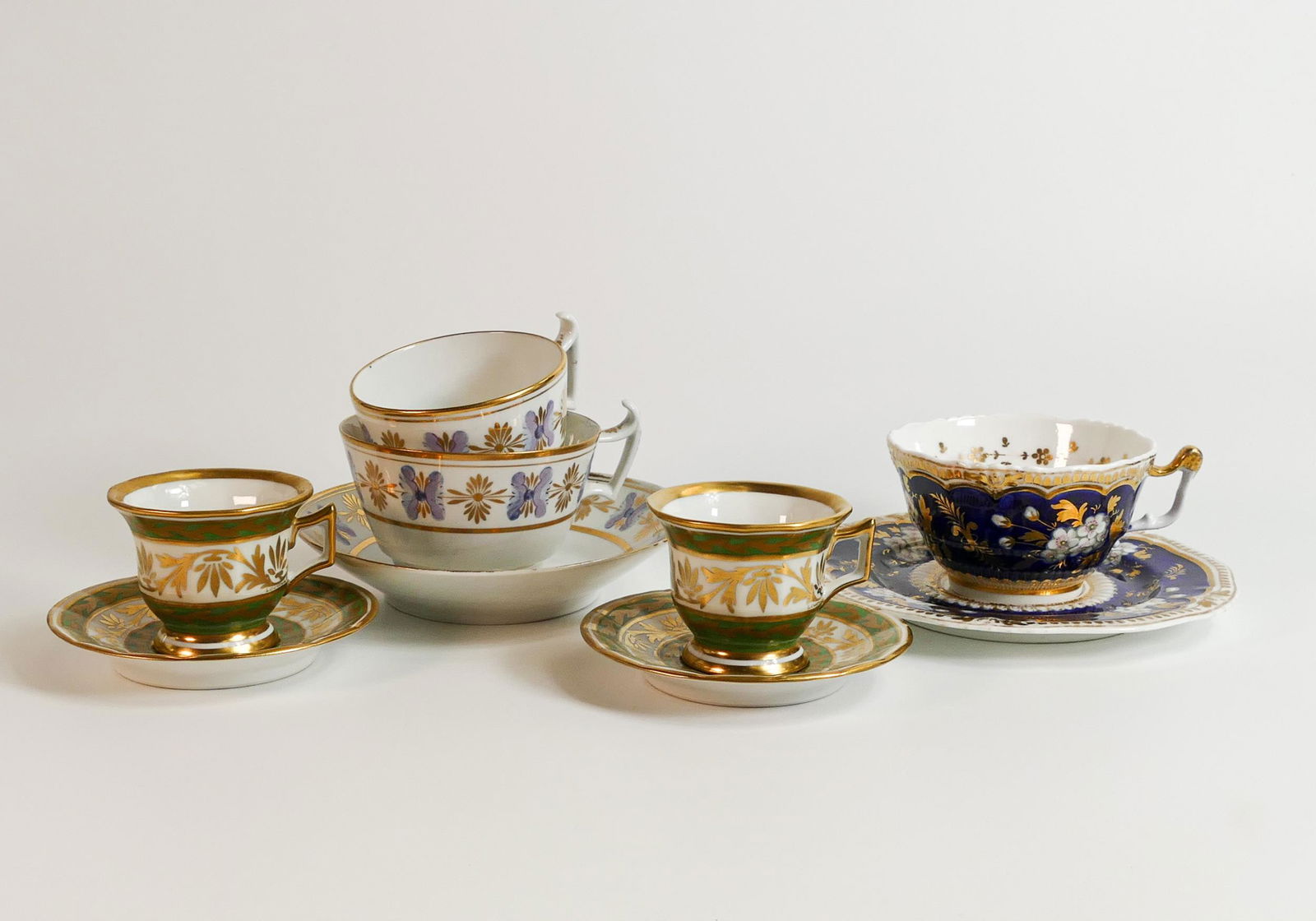 A collection of 19th century cups & saucers to include unmarked Coalport true trio, Yates pattern (1 of 5)