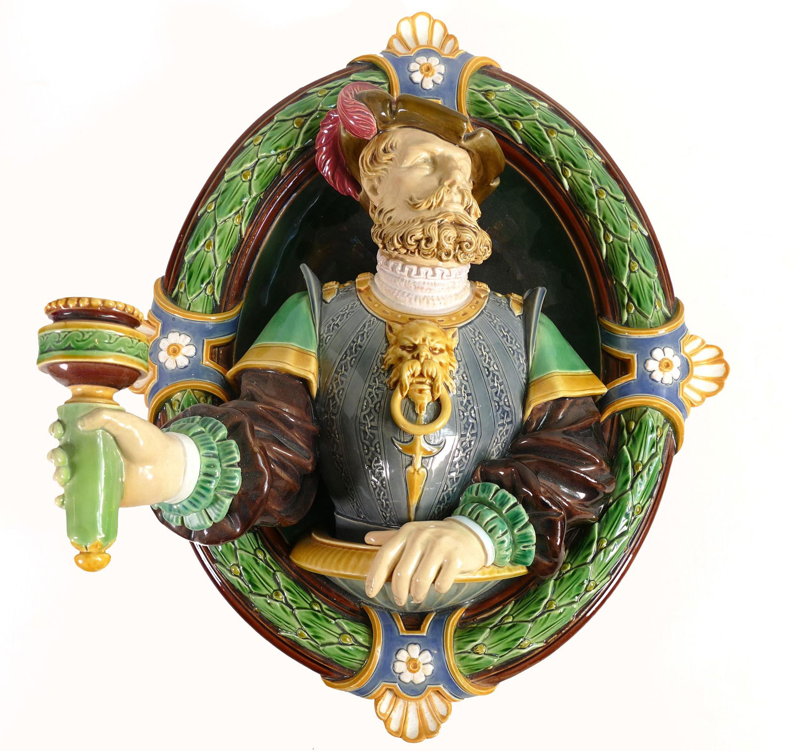 Minton Majolica wall sconce, in the form of a Renaissance man holding a torch, set in oval laurel (1 of 3)