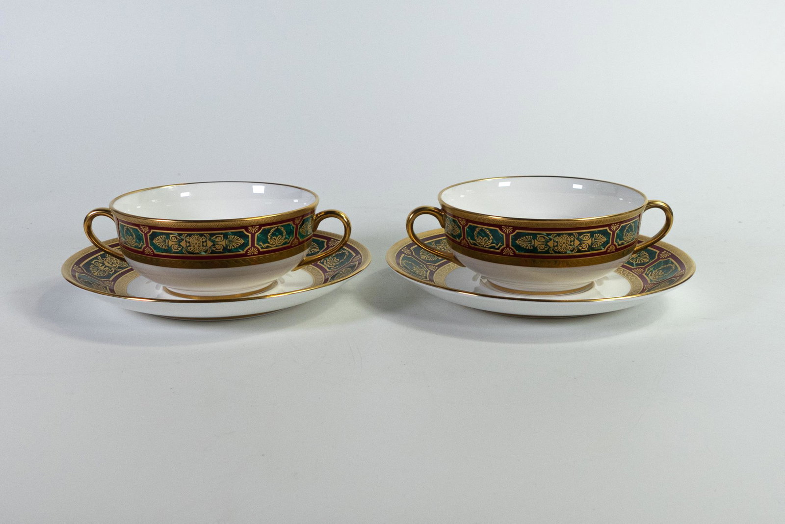 De Lamerie Fine Bone China heavily gilded Empire pattern handled soup bowls & saucers, specially: De Lamerie Fine Bone China heavily gilded Empire pattern handled soup bowls & saucers, specially made high end quality items, Made in England (4)
