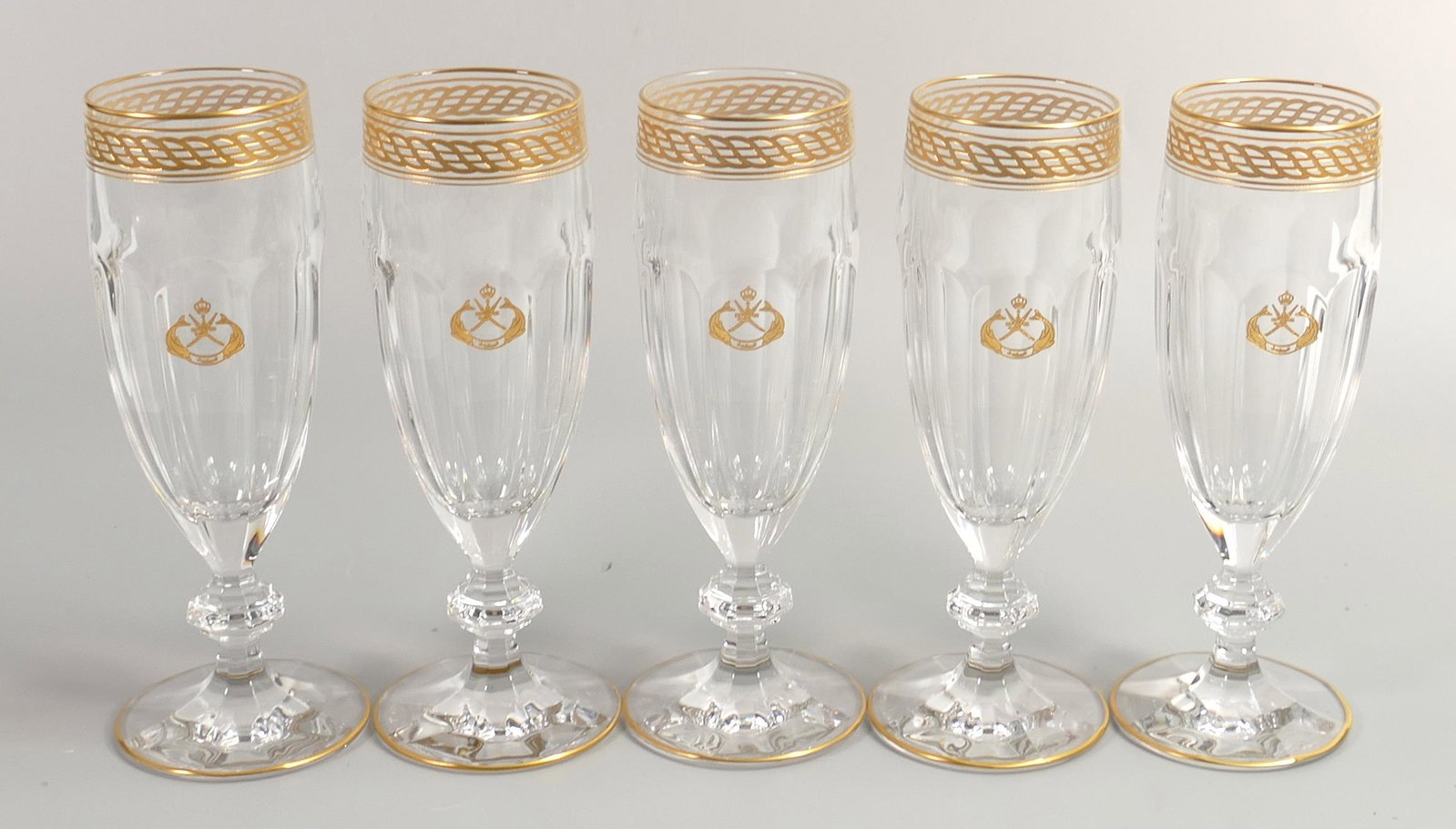De Lamerie Fine Bone China Rope design patterned heavily gilded Champagne flutes for Charles: De Lamerie Fine Bone China Rope design patterned heavily gilded Champagne flutes for Charles Kendall, Oman Motif, specially made high end quality items, made in England, height 17.5cm (5)