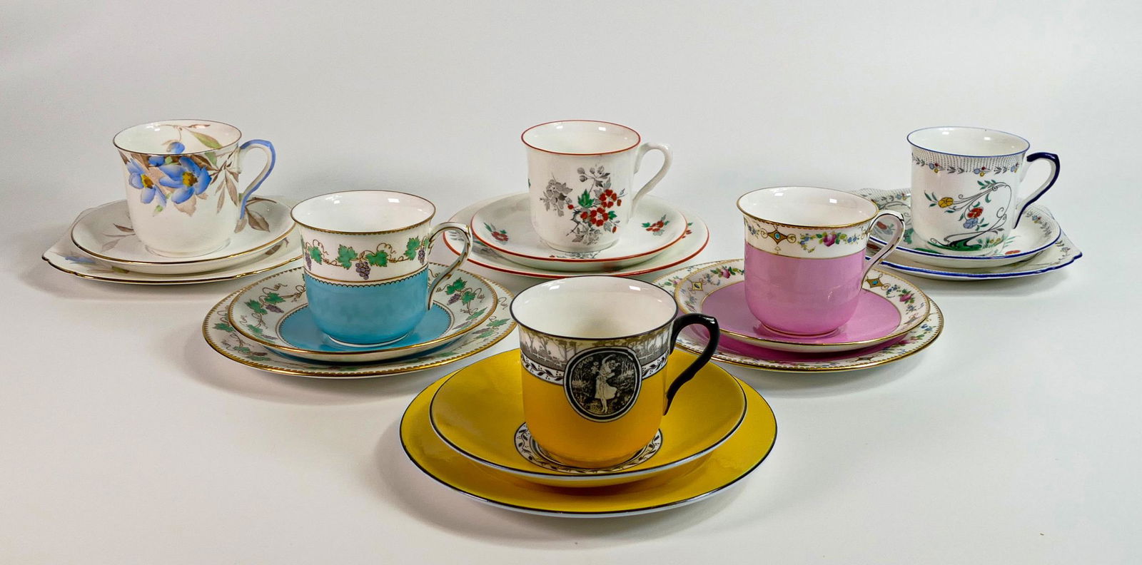 Six Shelley Vincent trios, pattern numbers 0101, 11603, 2120, 2046 and 11204/25 some faults noted (1 of 3)