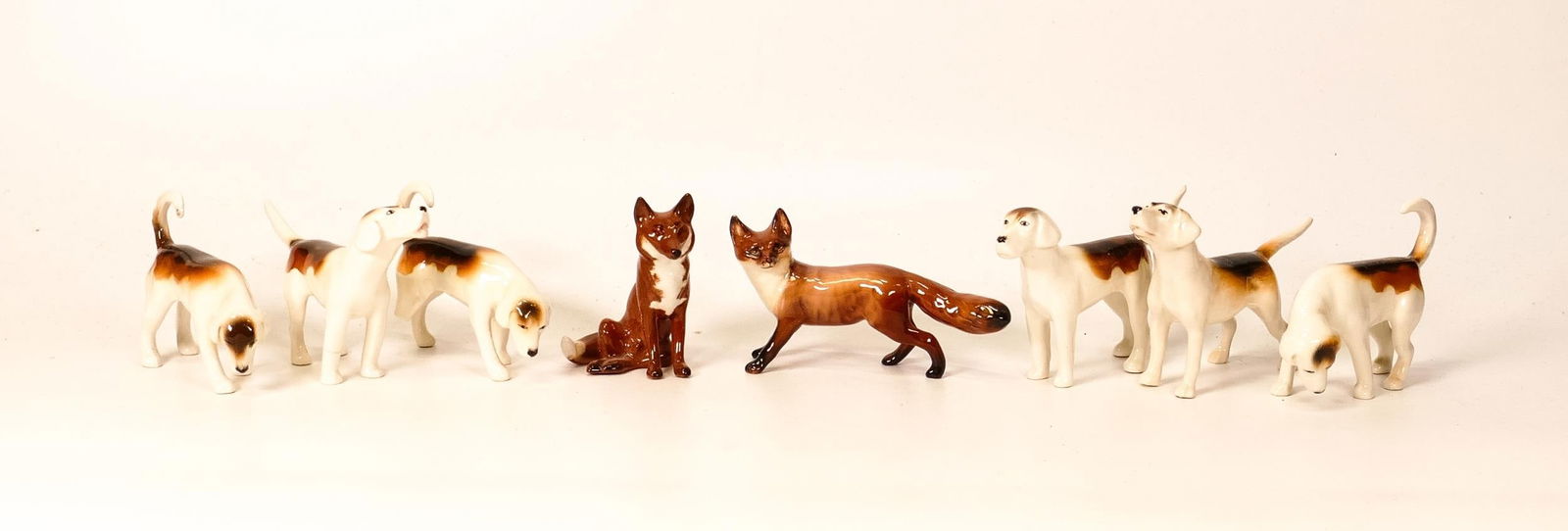 Beswick Fox Hounds & small standing fox, seated fox etc(8) (1 of 1)