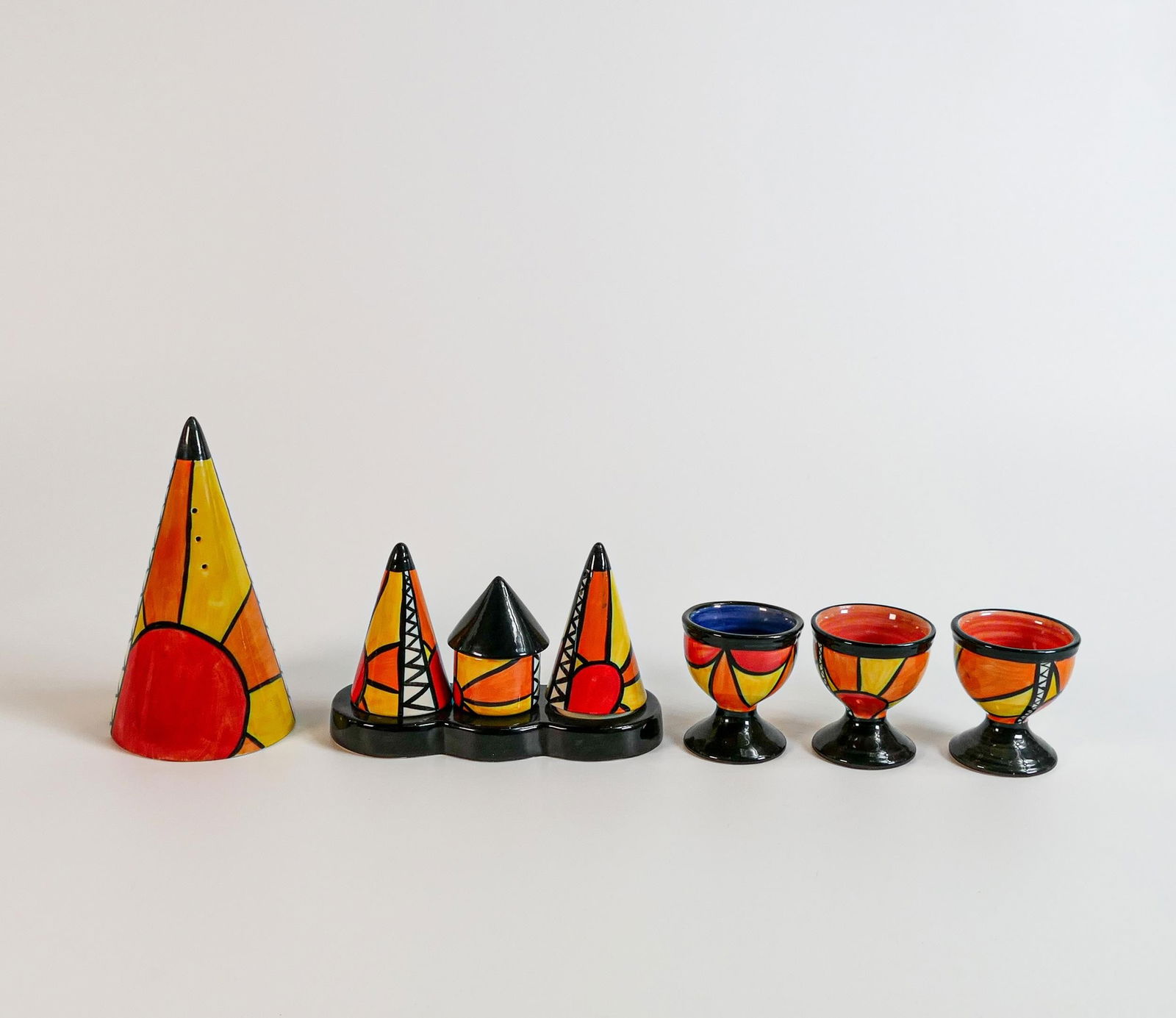 Lorna Bailey Sunburst pattern condiment set, sugar sifter & 3 egg cups, height of tallest 14cm (5): Lorna Bailey Sunburst pattern condiment set, sugar sifter & 3 egg cups, height of tallest 14cm (5)