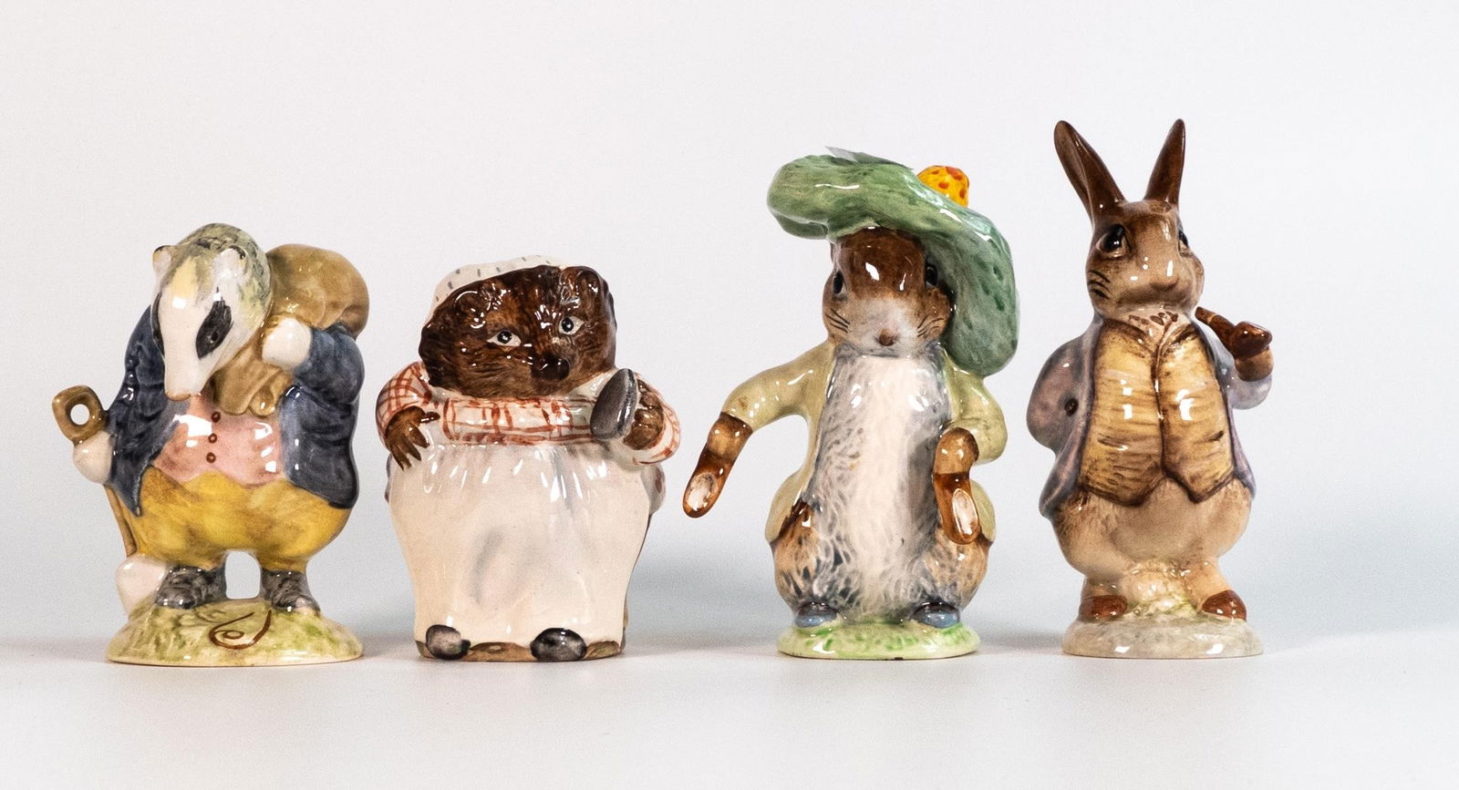 Beswick Beatrix Potter 1st Version figures to include - Tommy Brock, Mr Benjamin Bunny, Mrs Tiggy: Beswick Beatrix Potter 1st Version figures to include - Tommy Brock, Mr Benjamin Bunny, Mrs Tiggy Winkle and Benjamin Bunny. All BP3A (4)
