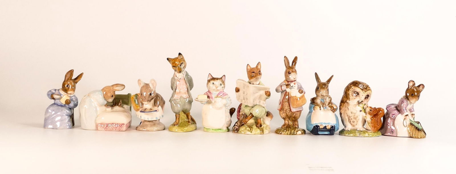 A collection of Beswick & Royal Albert Beatrix Potter figures to include - Peter Post (10b), Mrs: A collection of Beswick & Royal Albert Beatrix Potter figures to include - Peter Post (10b), Mrs Rabbit & Bunnies (3b), Peter in Bed (10a boxed), Cottontail (3b), Hunca Munca Sweeping (3b), Old Mr Bro