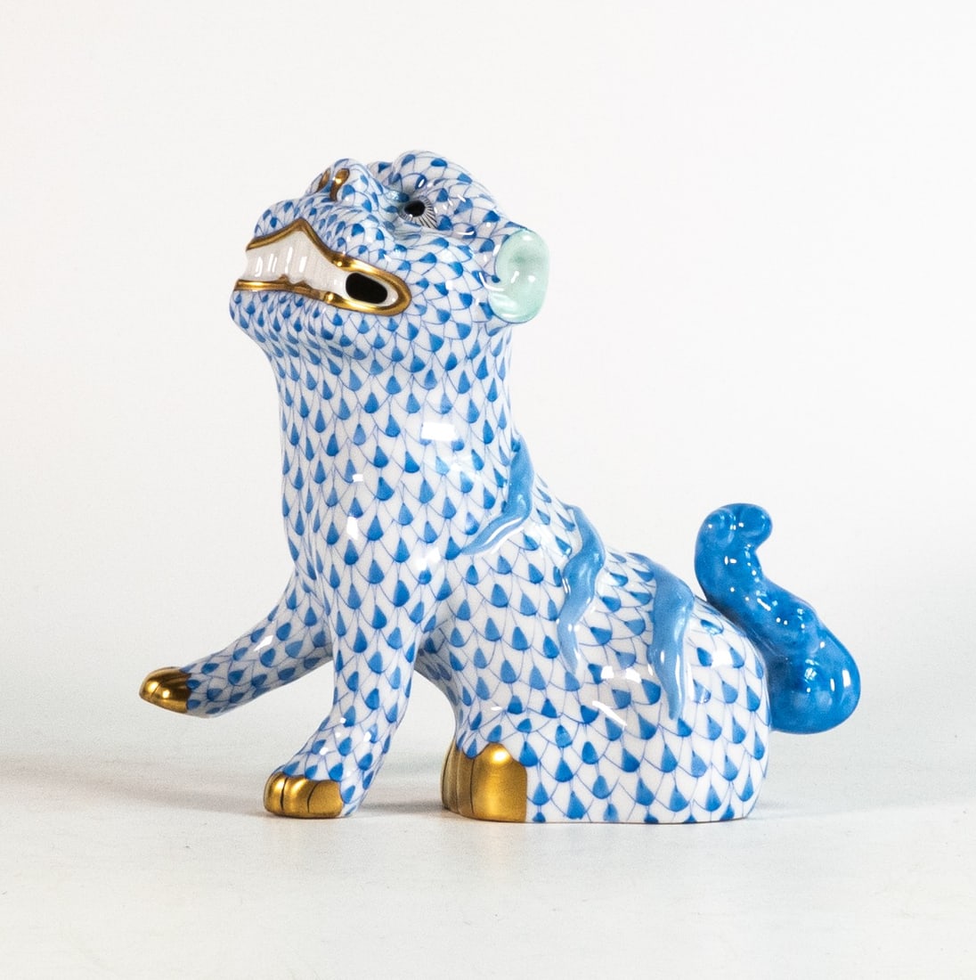 Herend hand painted figure of a blue Lion dog, Herend Hungary backstamp, height 14.5cm (1 of 2)