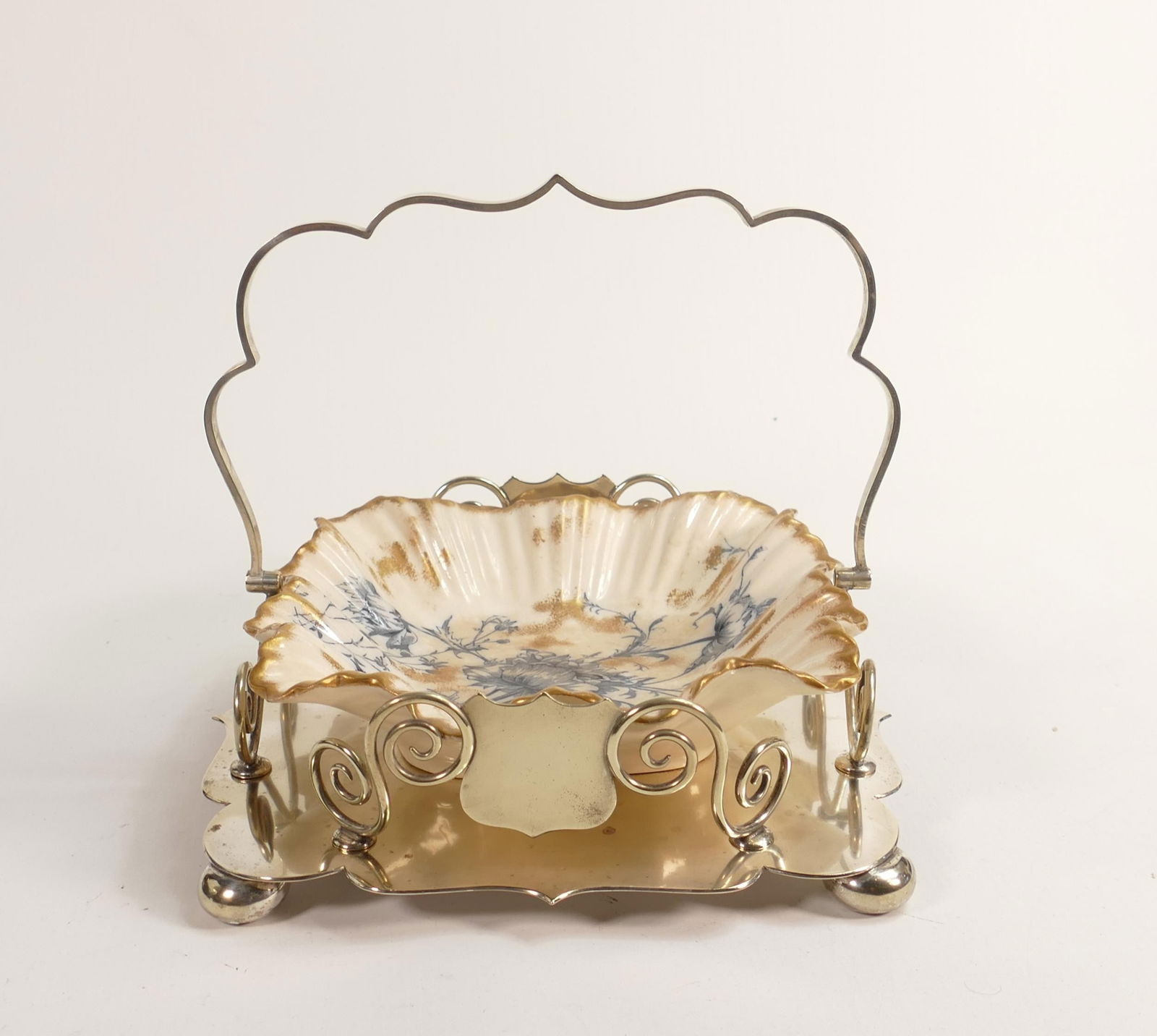 Carlton blush ware metal mounted square ruffle edged EntrÃ©e dish, with poppy decoration, by: Carlton blush ware metal mounted square ruffle edged EntrÃ©e dish, with poppy decoration, by Wiltshaw & Robinson, c1900, length 22cm, height 19cm