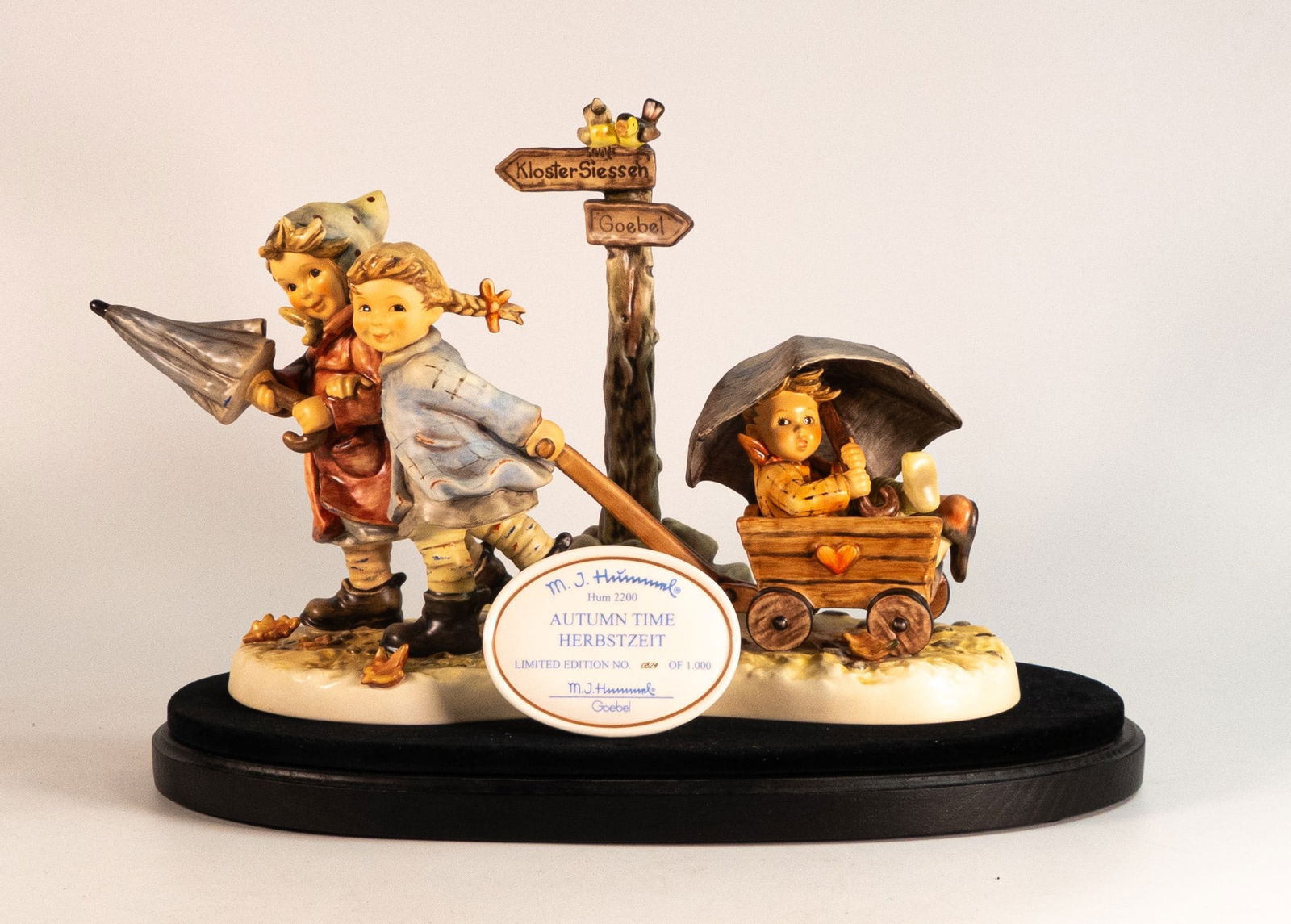 Boxed Goebel M J Hummel figure Autumn Time 2200 on wooden plinth with limited edition plaque, height (1 of 3)