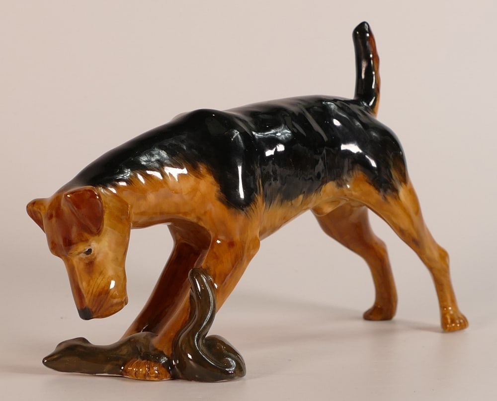 Minton figure of an Airdale terrier, shape No. 3938, 18cm long, Minton printed mark: Minton figure of an Airdale terrier, shape No. 3938, 18cm long, Minton printed mark