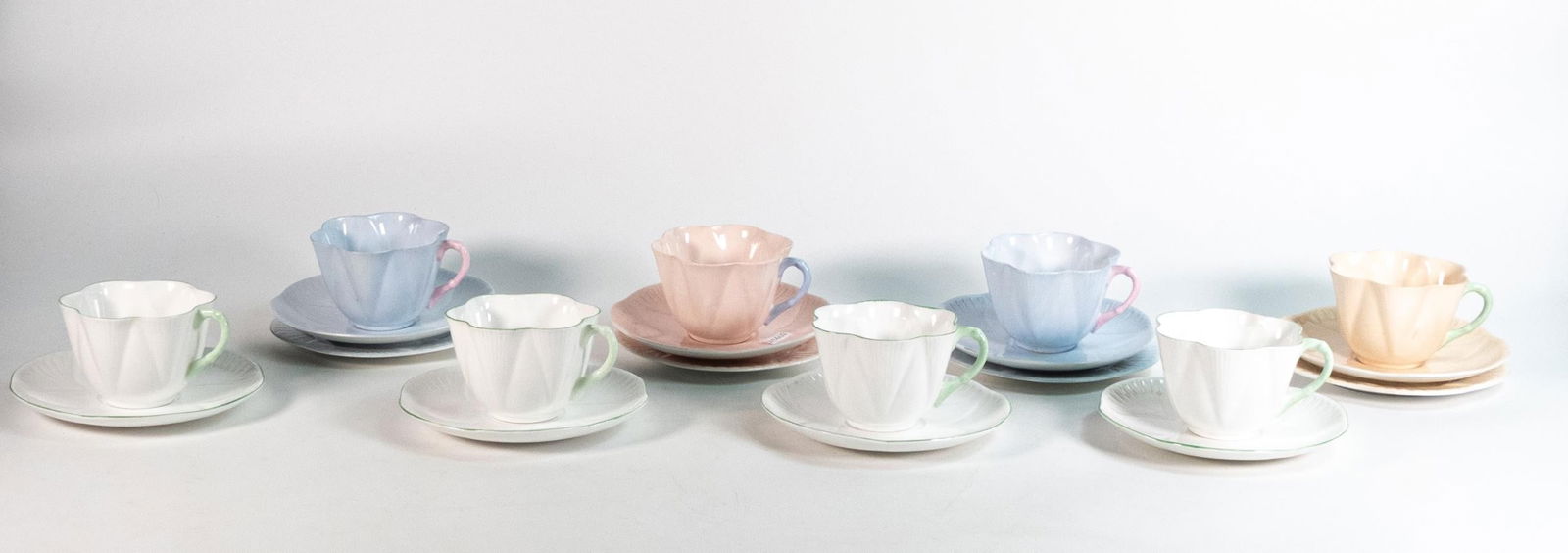 Shelley Dainty trios x 4 to include 13567/515, 13567/510 x 2, 13618 together with green handled cups: Shelley Dainty trios x 4 to include 13567/515, 13567/510 x 2, 13618 together with green handled cups & sauces (20 pieces)