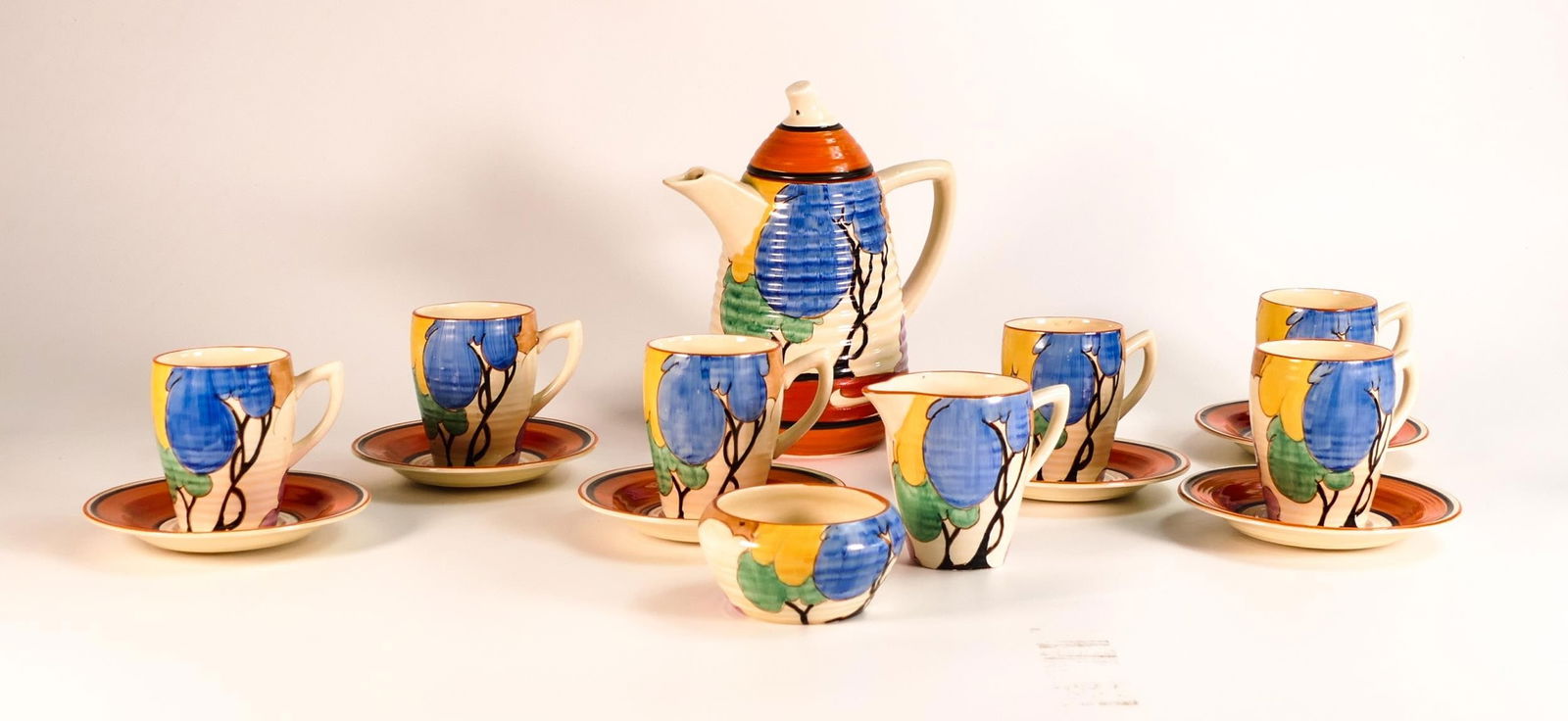 Rare Clarice Cliff Blue Autumn coffee set in Lynton shape c1934, comprising coffee pot, sugar and (1 of 7)