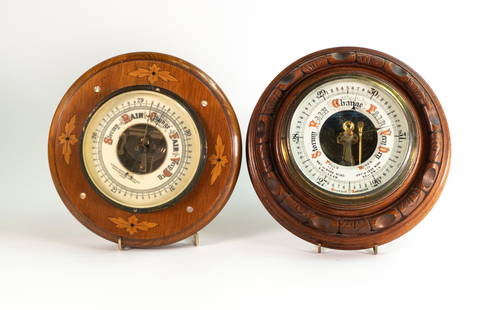 Two Victorian Aneroid barometers, one example with mother of pearl and wood inlay made by Thomas: Two Victorian Aneroid barometers, one example with mother of pearl and wood inlay made by Thomas Armstrong & Brother No.2101. The other unmarked. Diameter of largest approx. 23cm