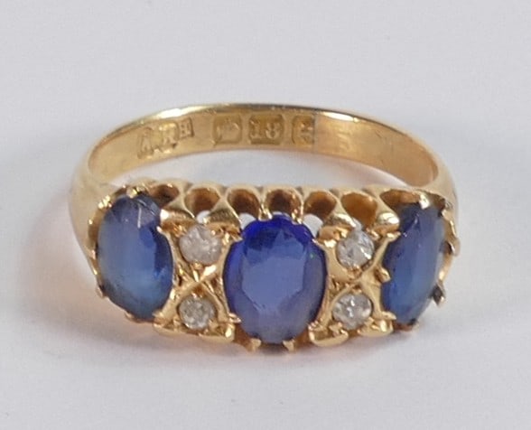 18ct gold three blue stone and diamond ring, size L, 3.7g. (1 of 3)