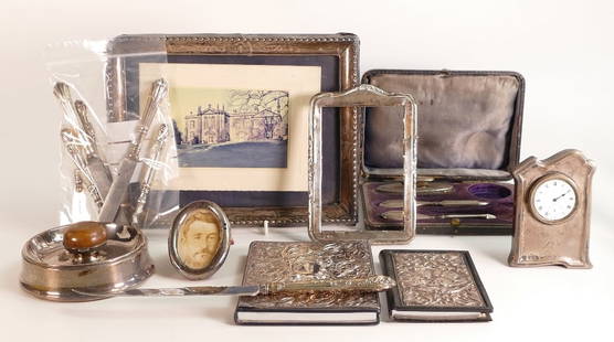 Job lot of various hallmarked silver items including 3 x photo frames, 2 x silver fronted books,: Job lot of various hallmarked silver items including 3 x photo frames, 2 x silver fronted books, part silver handled manicure set cased, silver fronted desk clock, unusual circular silver cased item,