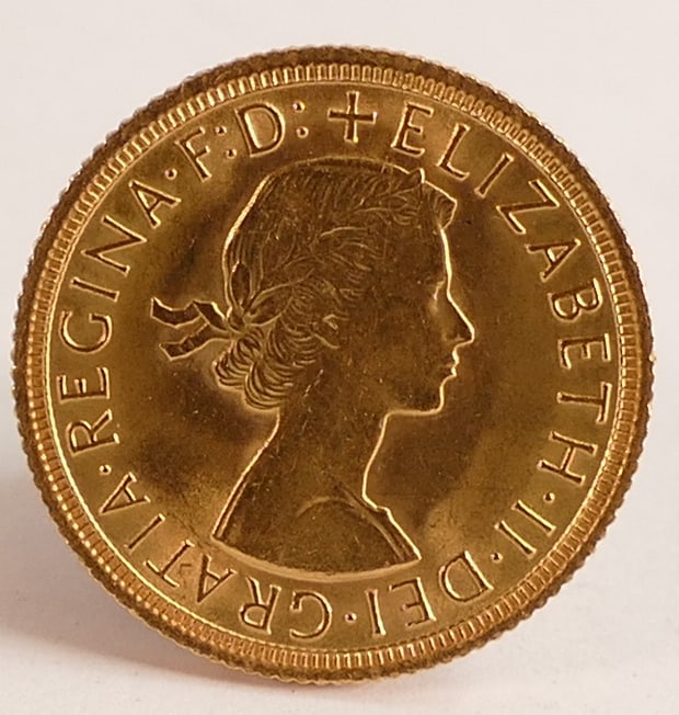 FULL Gold Sovereign, Elizabeth II, dated 1963, near uncirculated.: FULL Gold Sovereign, Elizabeth II, dated 1963, near uncirculated.