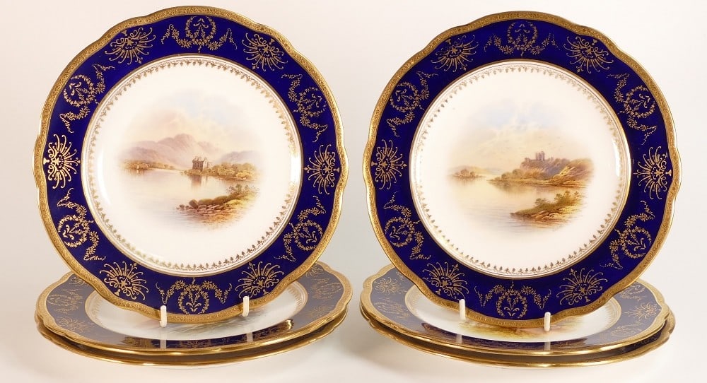A set of 19th century Coalport cabinet plates, each gilded & hand painted with castles, rivers and: A set of 19th century Coalport cabinet plates, each gilded & hand painted with castles, rivers and Lochs by E Ball, d.22.5cm. (6)