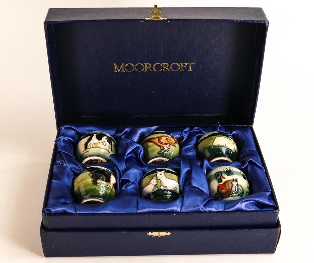 A boxed Moorcroft set of six Farmyard design egg cups by Anji Davenport, signed - all in good: A boxed Moorcroft set of six Farmyard design egg cups by Anji Davenport, signed - all in good condition
