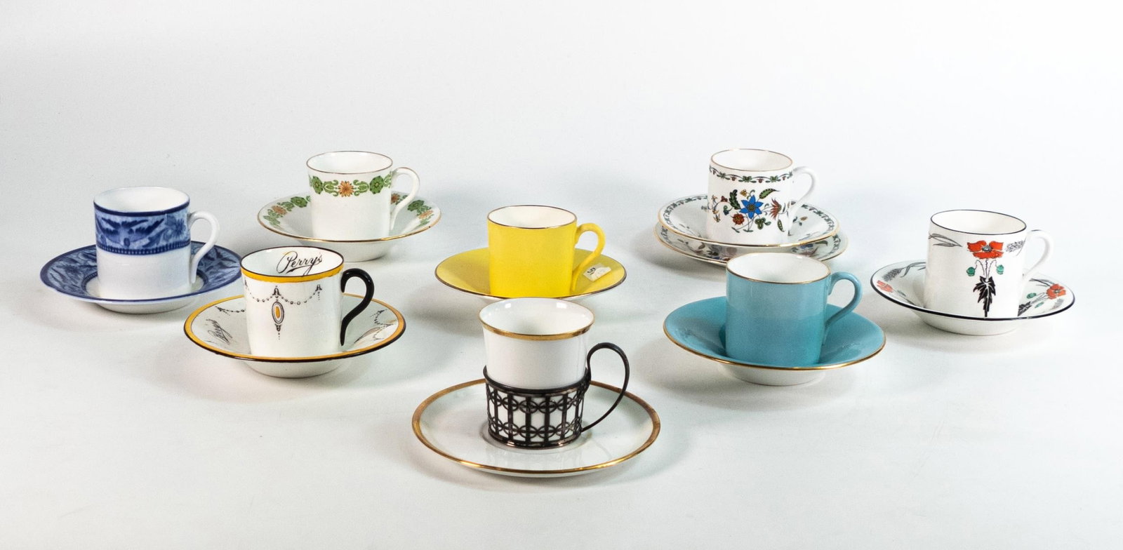 Eight Shelley Mocha cans & saucers - patterns 8932, 8777, 11326, 11280, 10333, blue bird, silver: Eight Shelley Mocha cans & saucers - patterns 8932, 8777, 11326, 11280, 10333, blue bird, silver holder & gold edge Perrys (16 pieces) some issues noted.