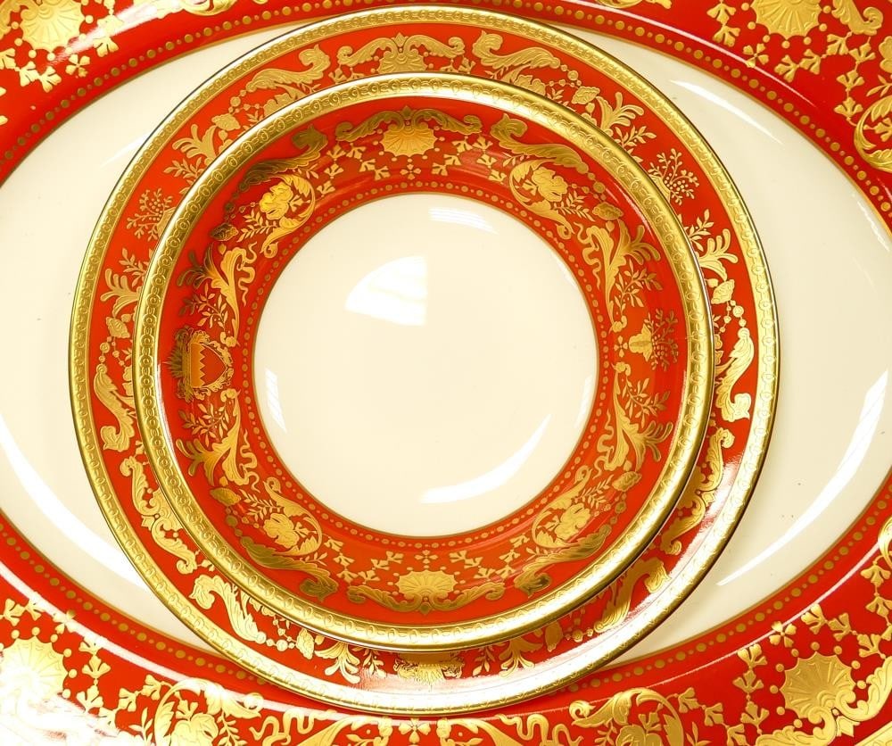 A collection of De Lamerie Fine Bone China heavily gilded Renaissance pattern dinnerware - three: A collection of De Lamerie Fine Bone China heavily gilded Renaissance pattern dinnerware - three 20.5cm plates, four 15cm fruit bowls, four 23cm rimmed bowls together with two 41cm & 39cm oval platter