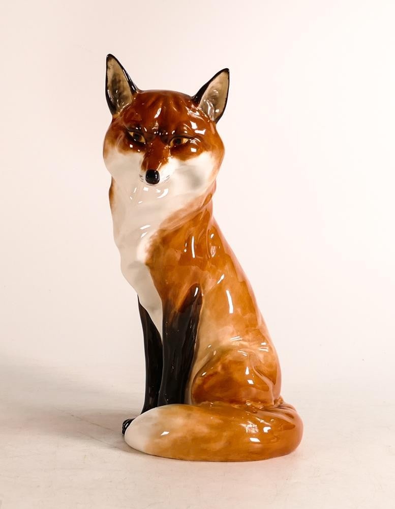 Royal Worcester figure of a seated Fox by Doris Lindner model 2993 19.5cm high: Royal Worcester figure of a seated Fox by Doris Lindner model 2993 19.5cm high