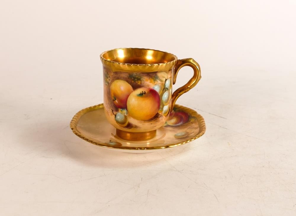Royal Worcester hand painted coffee cup and saucer. Painted in full with fruit still life by William: Royal Worcester hand painted coffee cup and saucer. Painted in full with fruit still life by William Roberts. Interior of cup and border are fully gilt. Height of cup: 6.4cm Diameter: 10.8cm