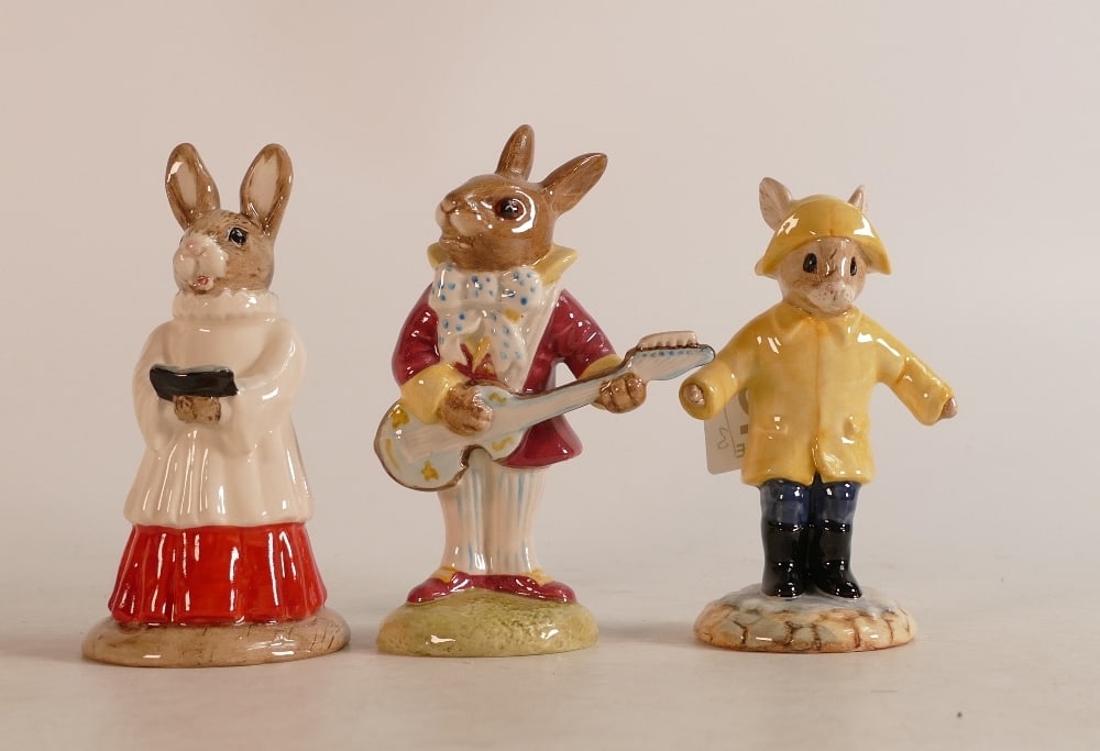Royal Doulton Bunnykins figures Rainy Day DB147, Choir Singer DB223 and Mr. Bunnybeat Strumming: Royal Doulton Bunnykins figures Rainy Day DB147, Choir Singer DB223 and Mr. Bunnybeat Strumming DB16, boxed (3)