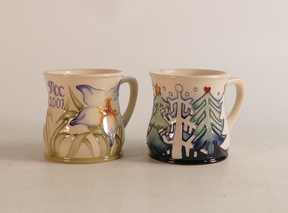 Two Moorcroft mugs to include MCC 2001 and Christmas woods (2): Two Moorcroft mugs to include MCC 2001 and Christmas woods (2)