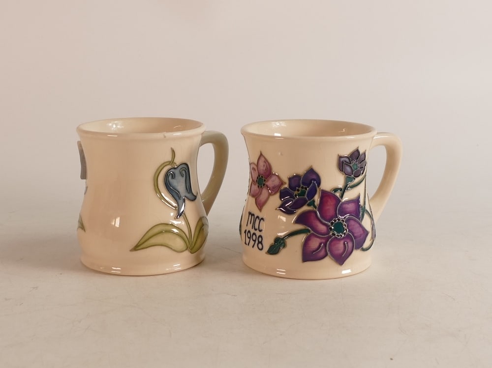 Two Moorcroft mugs to include bluebell (crazed) and Mcc 1998 (2): Two Moorcroft mugs to include bluebell (crazed) and Mcc 1998 (2)