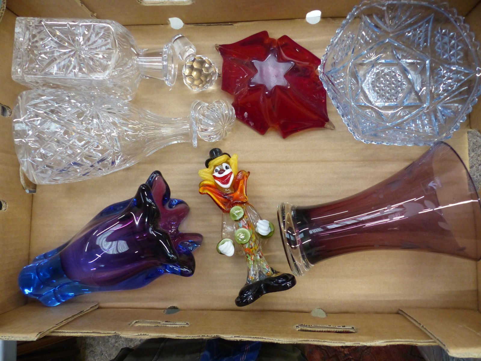 A collection of glass and crystal items to include two crystal decanters, art glass vase, (1 of 1)
