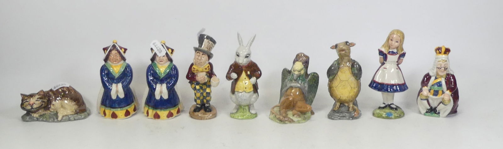Nine Beswick 'Alice in Wonderland' Figures to include Alice, Queen of Hearts x2, King of Hearts, (1 of 1)