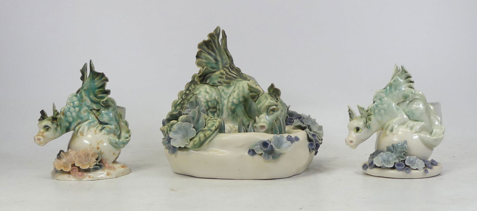 Chessel Studio Pottery, Three Models of Dragon with modelled flowers. Height of tallest: 15cm (3) (1 of 1)
