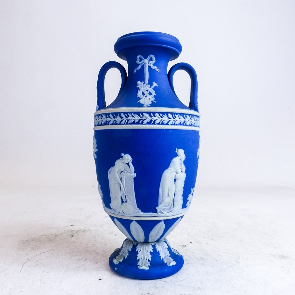 Early 20th century Wedgwood dark blue dipped jasperware two handled urn & cover, decorated with (1 of 3)