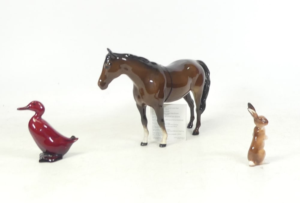 Beswick Brown Gloss Horse (head to left, swishing tail) 12cm tall also Royal Doulton small Flambe: Beswick Brown Gloss Horse (head to left, swishing tail) 12cm tall also Royal Doulton small Flambe Standing Duck (beek a/f) Standing Hare k39(3)