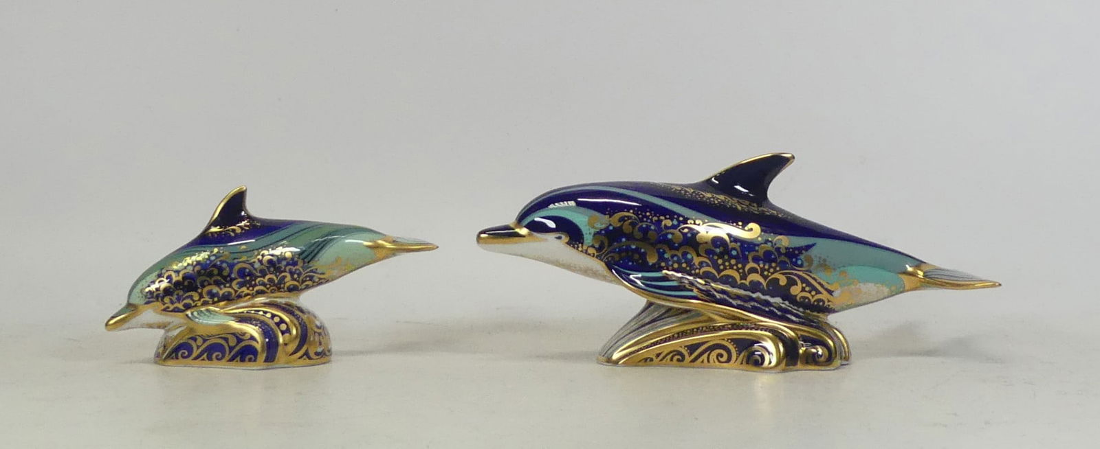 Royal Crown Derby, Bottlenose Dolphin and Baby Bottlenose Dolphin Paperweight. Gold Stopper (2): Royal Crown Derby, Bottlenose Dolphin and Baby Bottlenose Dolphin Paperweight. Gold Stopper (2)