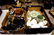 A collection of various items to include cameras,